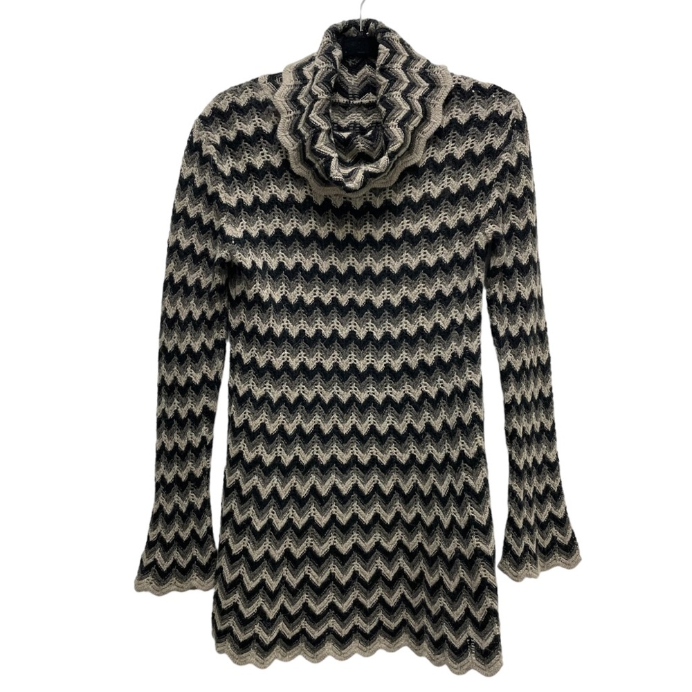 Hand knit wool long length zig-zag pattern oversized cowl neck sweater and hem.